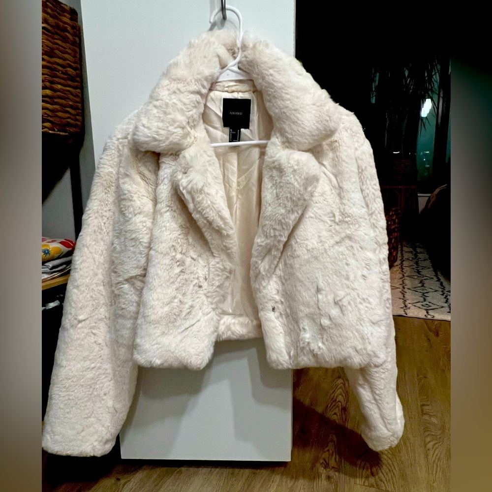 Plushed cropped coat from Forever 21. Only worn once - new condition.